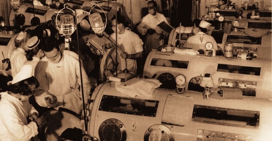 Iron lungs crowd a polio ward in Boston during 1955 epidemic
